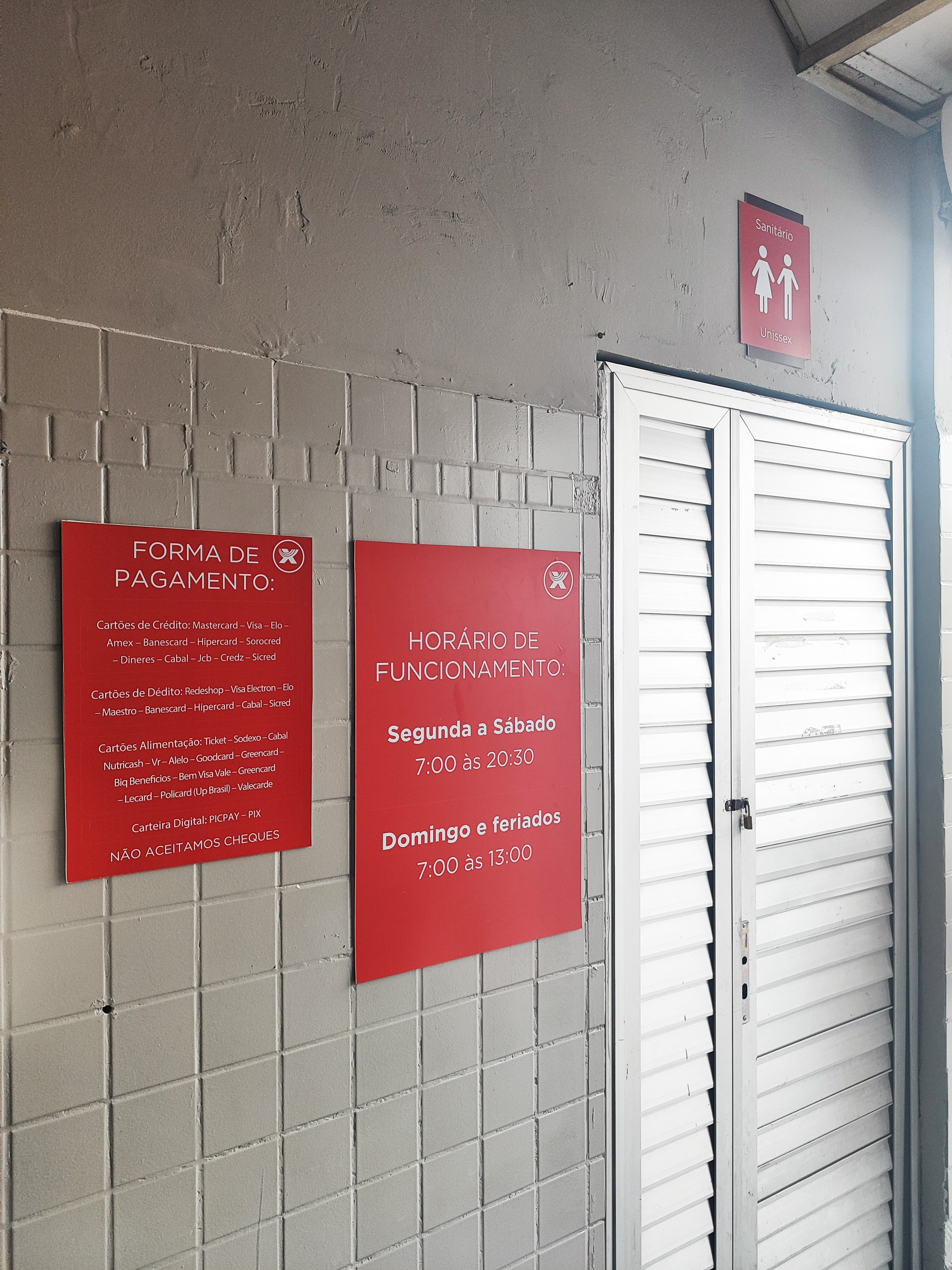 Placas de horário e formas de pagamento